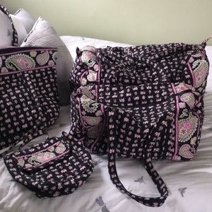 Vera Bradley pink elephant travel set.